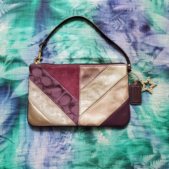 Coach Handbags - 🌠 Coach Wristlet with Star Charm